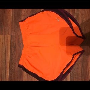 Orange & purple nike shorts
